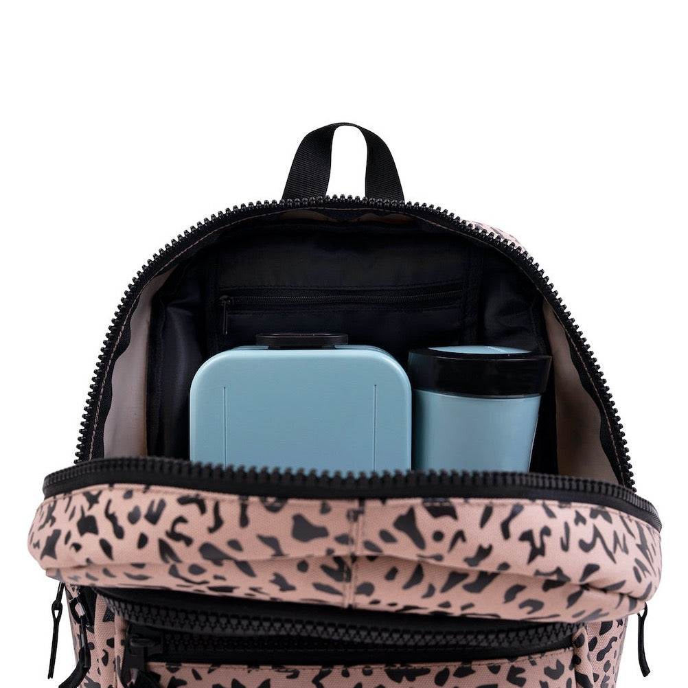 Load image into Gallery viewer, This picture shows a kids backpack in dessert shark print. Made from recycled plastic. Adjustable comfort straps. Front pocket with zip. A padded compartment inside and pockets for a lunchbox and water bottle. 

