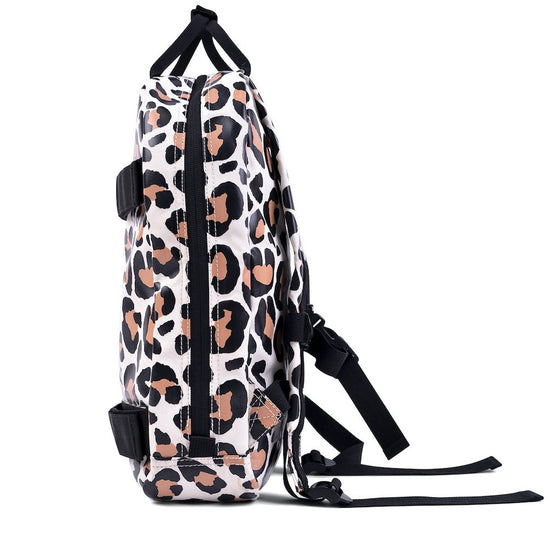 Load image into Gallery viewer, This picture shows a kids backpack in a leopard print. Made from recycled plastic. Adjustable padded straps. Front pocket with zip. Straps on the front for your skateboard.
