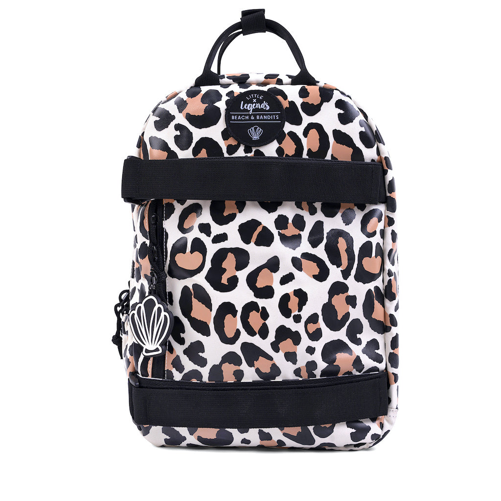 This picture shows a kids backpack in a leopard print. Made from recycled plastic. Adjustable padded straps. Front pocket with zip. Straps on the front for your skateboard. 