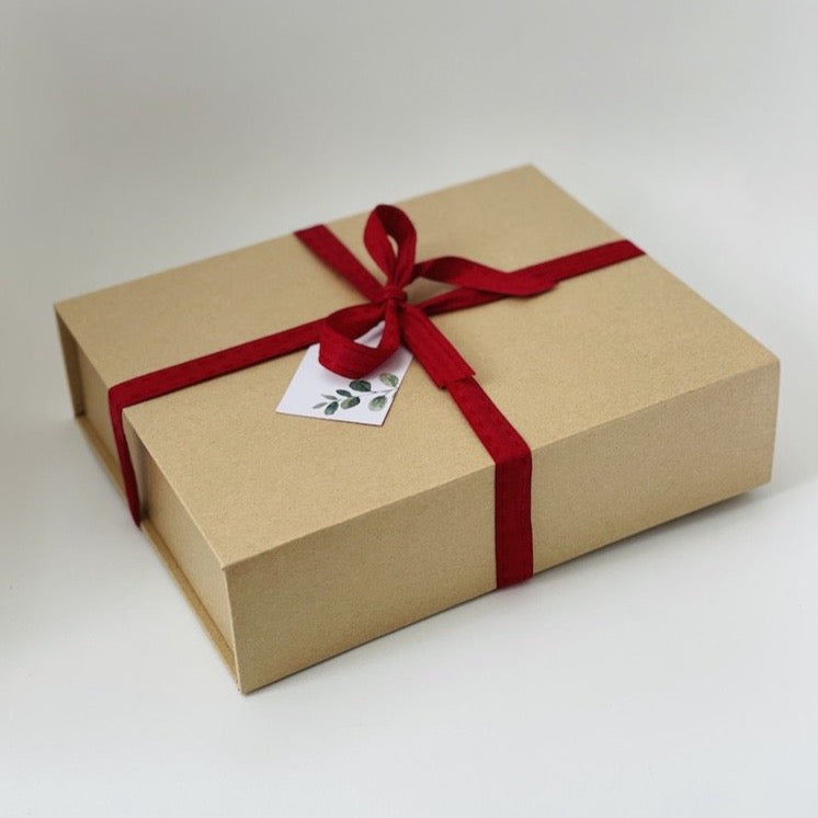 GIftbox with red ribbon and gift tag