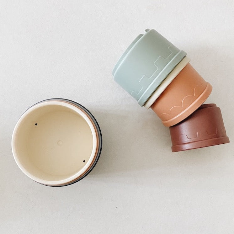 8 pieces of stacking cups for your little one. perfect from 6 months old. beautiful muted colours. stackable