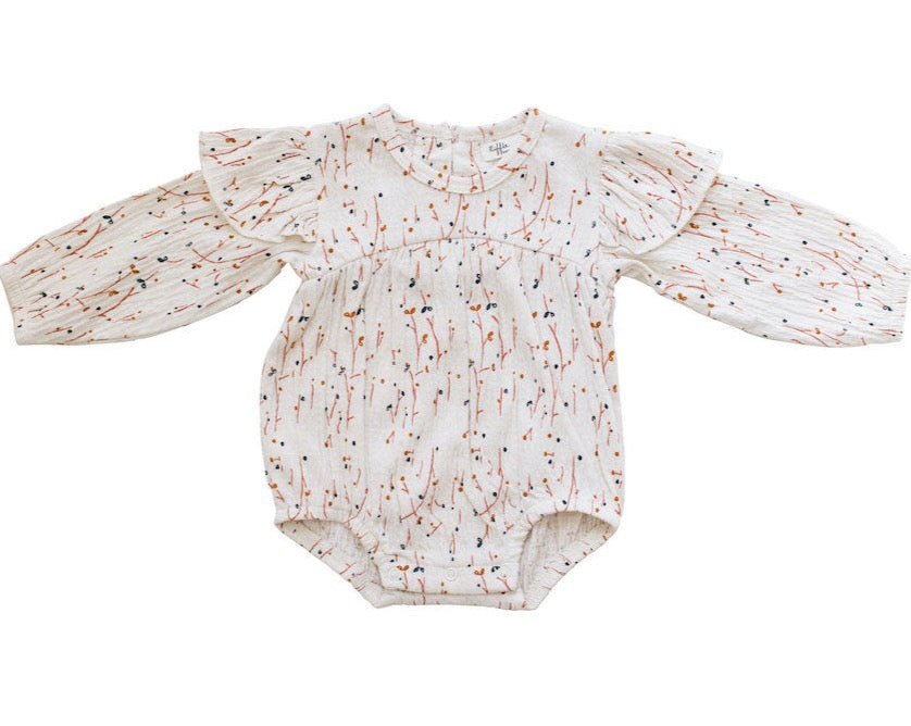 This cozy long sleeve romper is made from the softest organic cotton and has a beautiful sweet blossom print. Available from newborn till 1 years