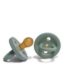 Natural Rubber dummy in a sage green colour.  Teat has rubber colour. 