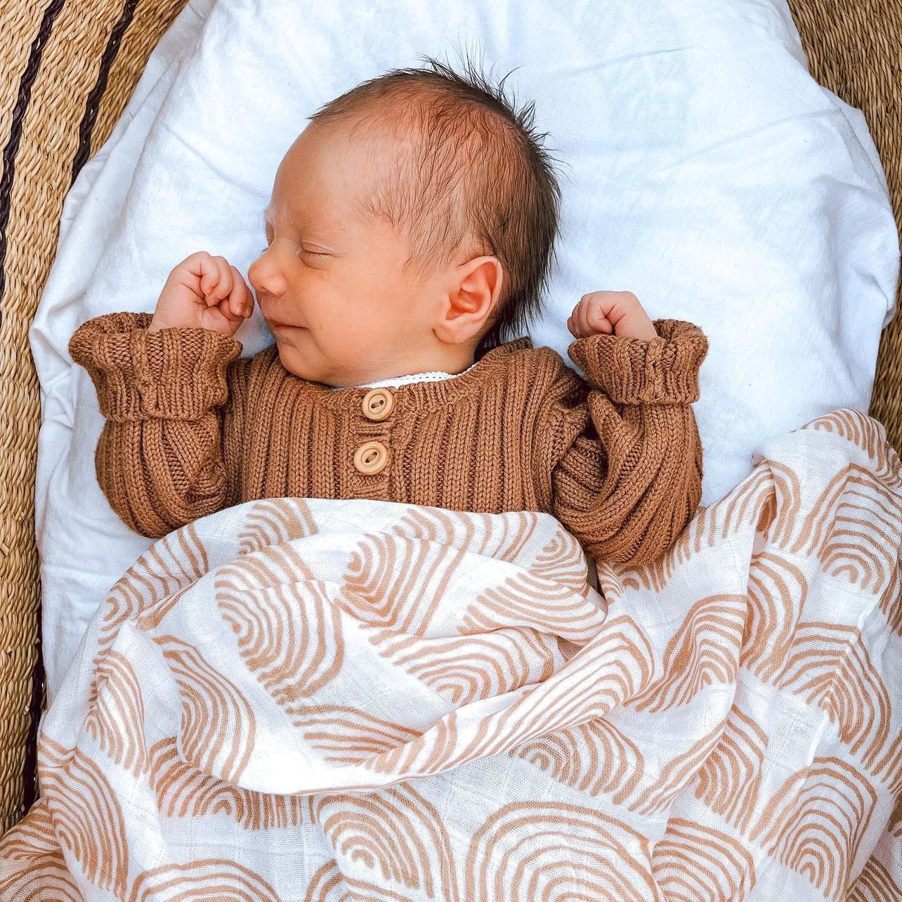 Load image into Gallery viewer, This picture shows a baby sleeping underneath the Bamboo / cotton Swaddle wrap with a sage palm print.
