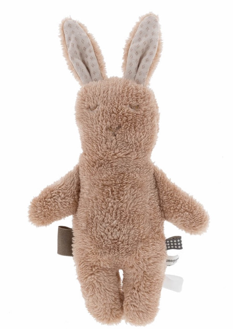 This Picture show an organic soft toy bunny in light pink with sensory tags on the side 