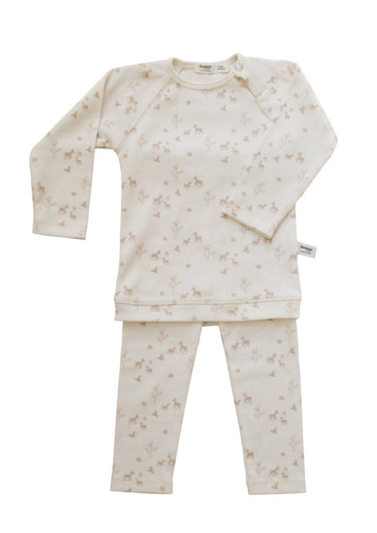 This picture shows a long sleeve pyjama set from Snoozebaby made from premium organic cotton is super soft on the skin and stretchy to allow comfort. 