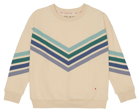 This picture shows an beige crew neck kids jumper with with  graphic blue lines on the front. 