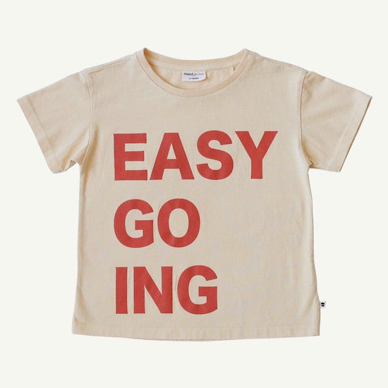 This picture shows an organic Kids t-shirt with a red easy going print at the front. 